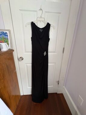 Elegant Black Sleeveless Evening Gown with Side Embellishment